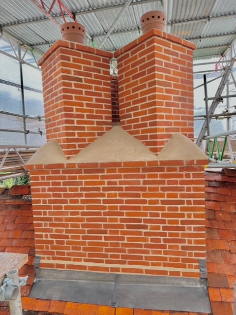 Listed building chimney rebuild in Weston