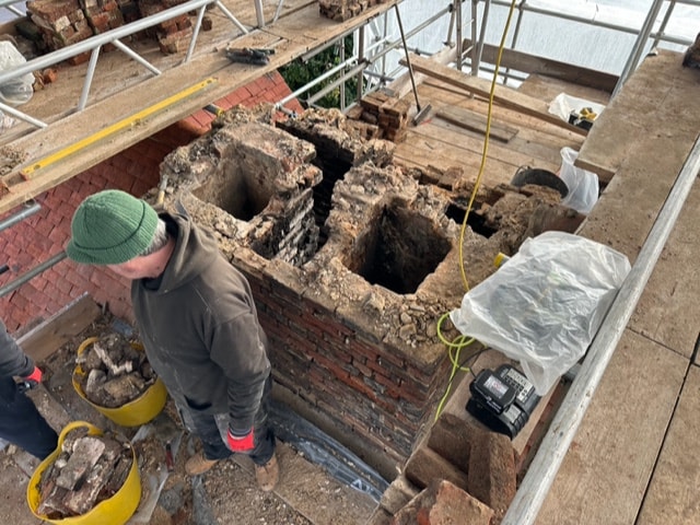 Listed building chimney rebuild in Weston