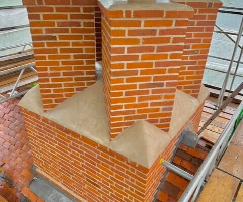 Listed building chimney rebuild in Weston