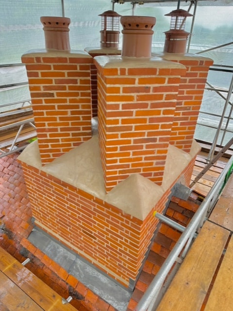 Listed building chimney rebuild in Weston