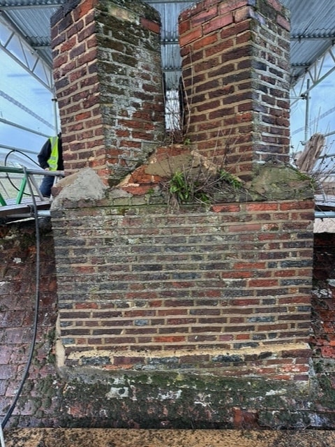 Listed building chimney rebuild in Weston